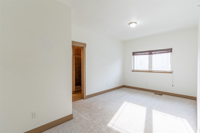119 Oak St, Whitefish, MT 59937 - carpeted empty room featuring baseboards