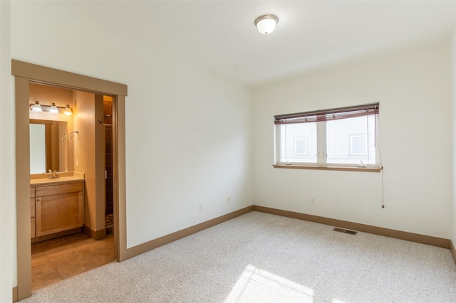 119 Oak St, Whitefish, MT 59937 - unfurnished room featuring light carpet and baseboards