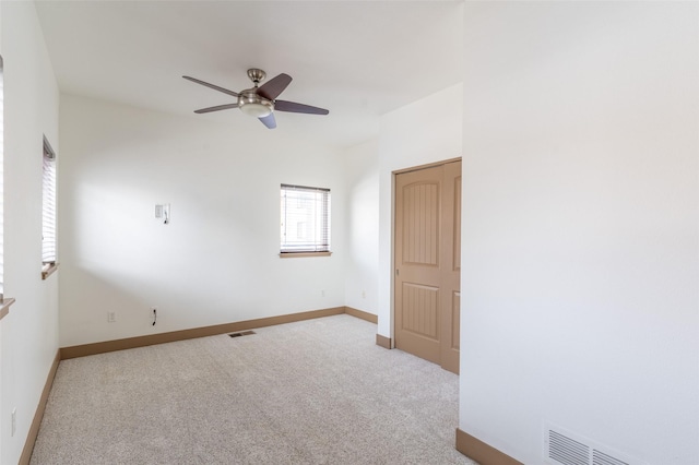 119 Oak St, Whitefish, MT 59937 - carpeted empty room featuring ceiling fan and baseboards