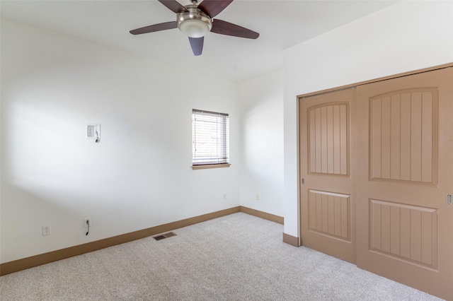 119 Oak St, Whitefish, MT 59937 - unfurnished bedroom with carpet floors, a closet, and a ceiling fan
