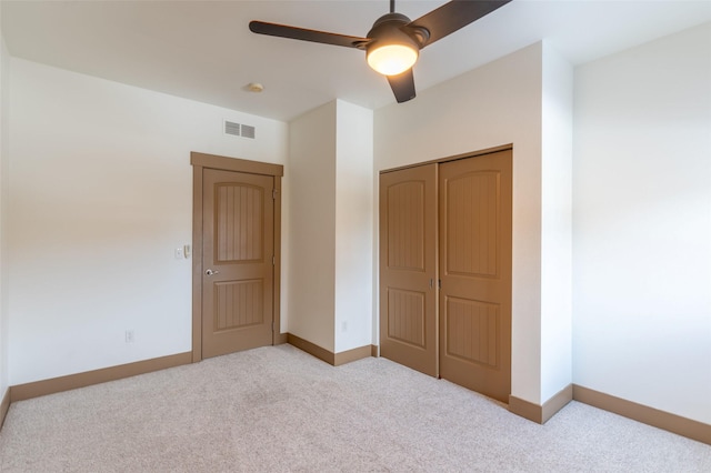 119 Oak St, Whitefish, MT 59937 - unfurnished bedroom with carpet flooring, a closet, and ceiling fan