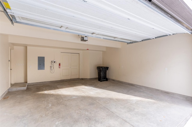 119 Oak St, Whitefish, MT 59937 - garage with electric panel and a garage door opener