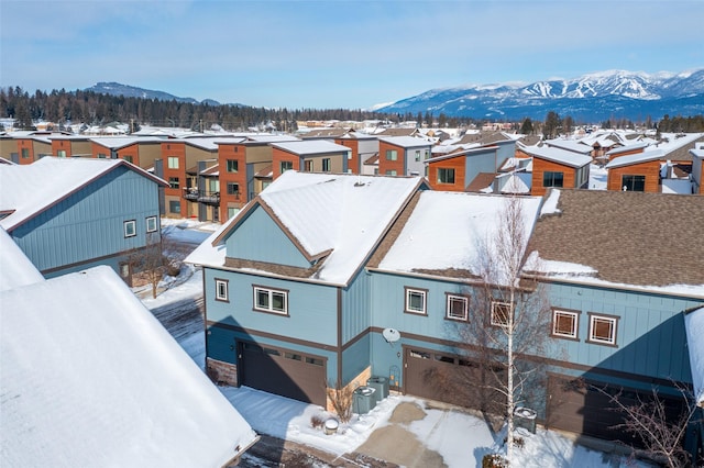 119 Oak St, Whitefish, MT 59937 - snowy aerial view with a residential view and a mountain view