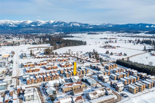 119 Oak St, Whitefish, MT 59937 - snowy aerial view featuring a mountain view