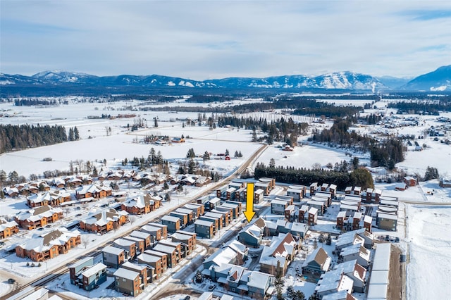 119 Oak St, Whitefish, MT 59937 - snowy aerial view featuring a mountain view