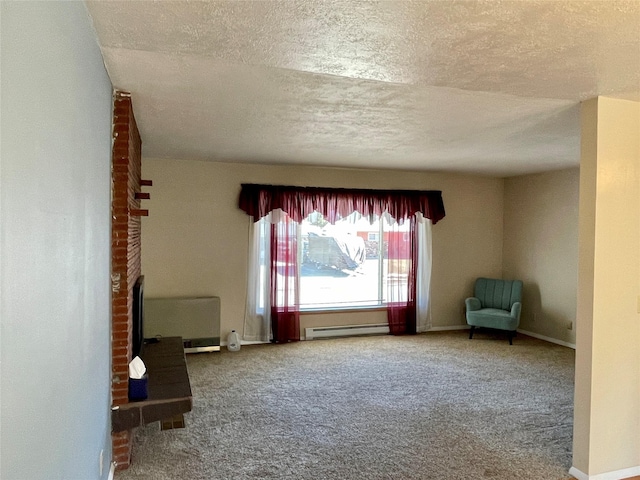 1408 Nevada Ave, Libby, MT 59923 - carpeted spare room featuring a baseboard radiator and a textured ceiling