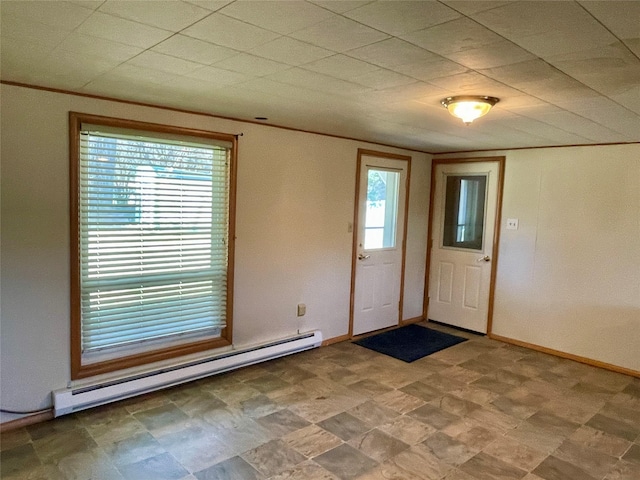 1408 Nevada Ave, Libby, MT 59923 - entrance foyer featuring baseboard heating and healthy amount of natural light