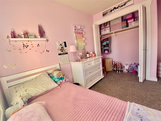 bedroom with dark colored carpet and a closet