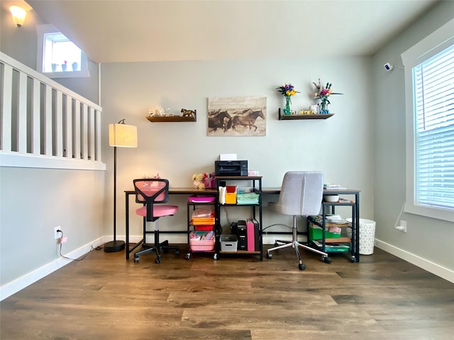 home office with baseboards and wood finished floors