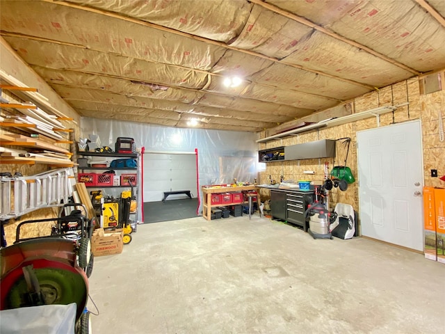 garage featuring a workshop area