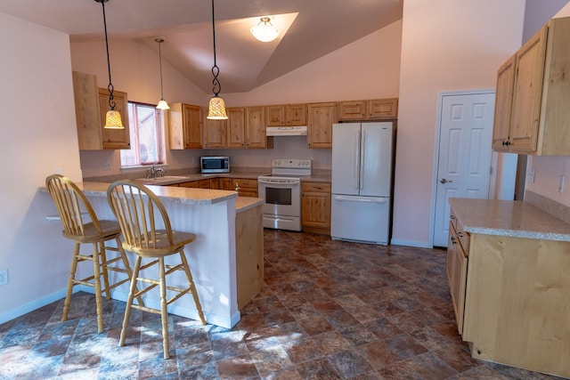 kitchen featuring under cabinet range hood, white appliances, a peninsula, light countertops, and baseboards