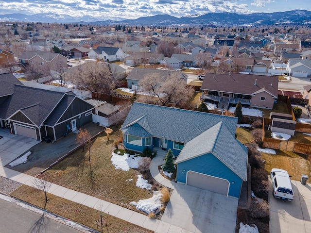 bird's eye view with a residential view and a mountain view