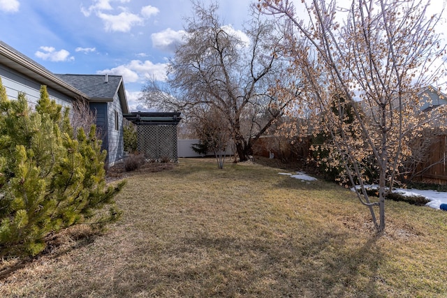 view of yard featuring fence