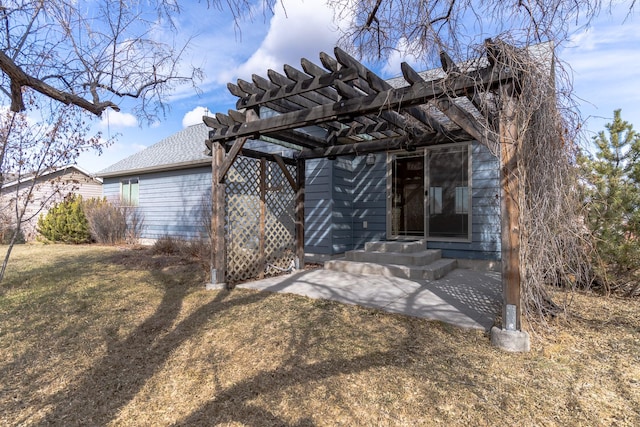 rear view of house with a pergola and entry steps