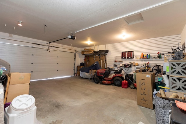 garage featuring a garage door opener