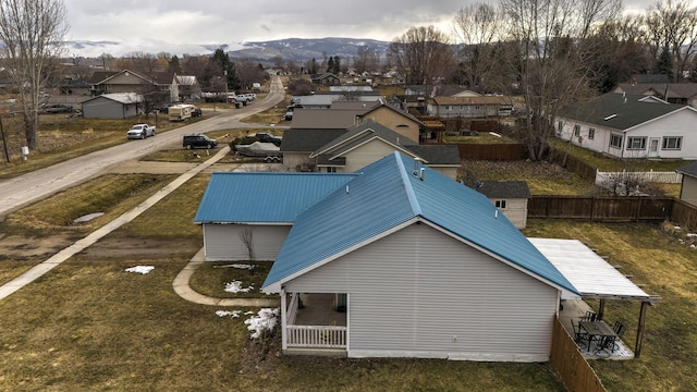 birds eye view of property featuring a residential view and a mountain view