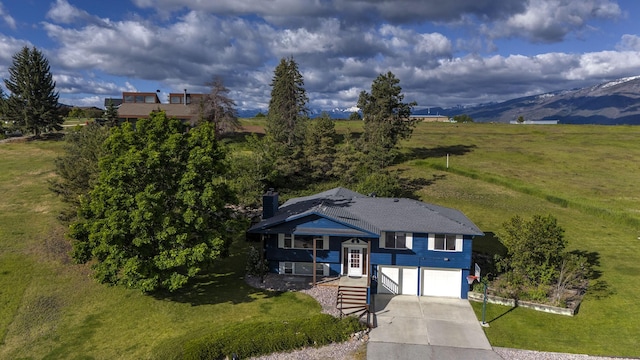 aerial view featuring a mountain view