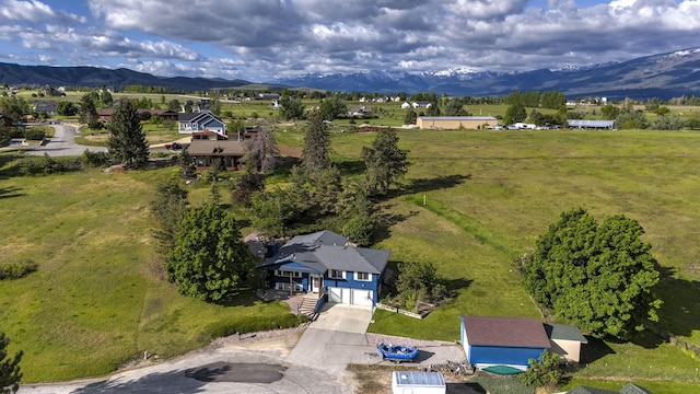 drone / aerial view featuring a mountain view