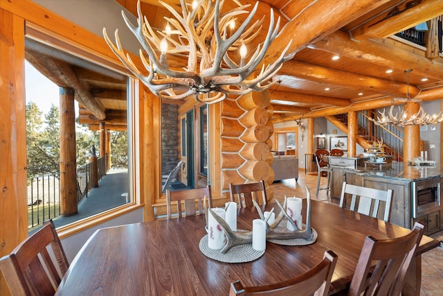 dining room with stairway, recessed lighting, beamed ceiling, a chandelier, and rustic walls