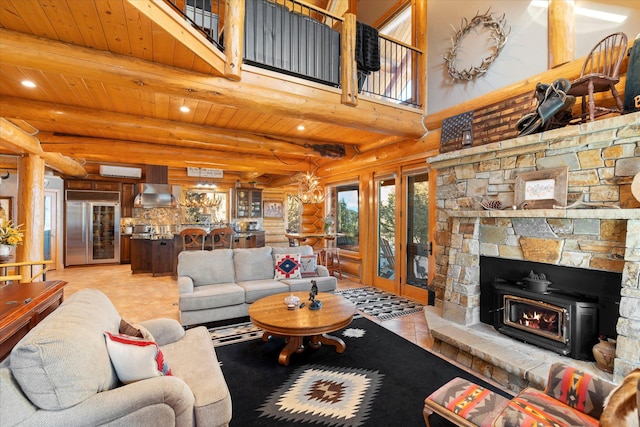 living room featuring beam ceiling, recessed lighting, a high ceiling, log walls, and wood ceiling