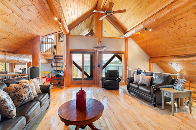 living room featuring beam ceiling, wood ceiling, and wood-type flooring