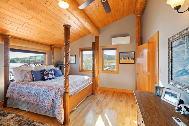 bedroom featuring light wood finished floors, multiple windows, vaulted ceiling with beams, and a wall mounted AC