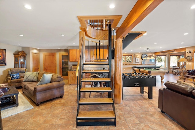 living area featuring recessed lighting, billiards, and stairs