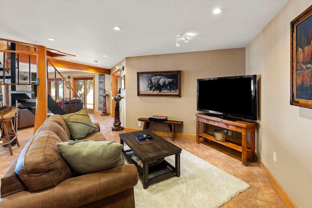 living area featuring recessed lighting, stairs, and baseboards