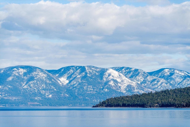 view of mountain feature with a water view