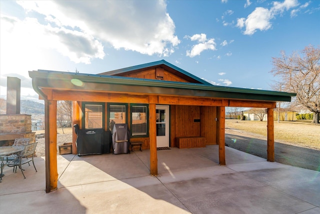 rear view of property with a patio