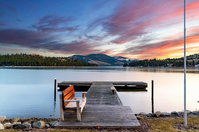 dock area featuring a water and mountain view