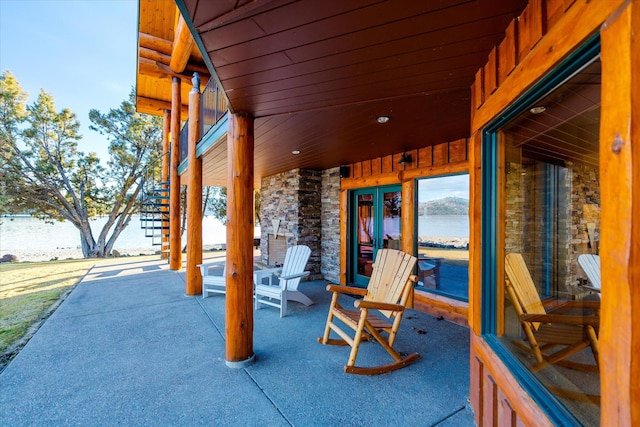 view of patio / terrace with a water view