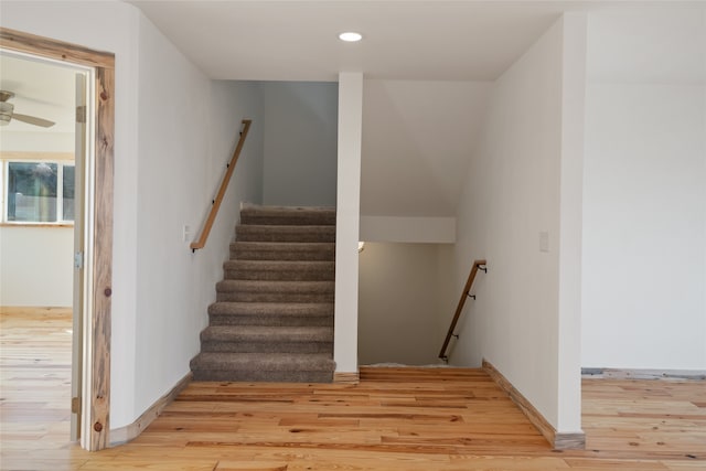 stairs with recessed lighting, baseboards, ceiling fan, and wood finished floors