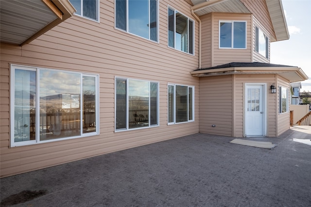 rear view of house with a patio