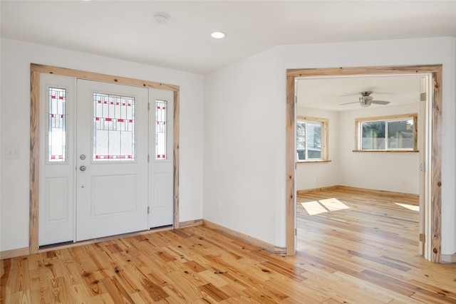 foyer featuring recessed lighting, light wood-type flooring, baseboards, and ceiling fan