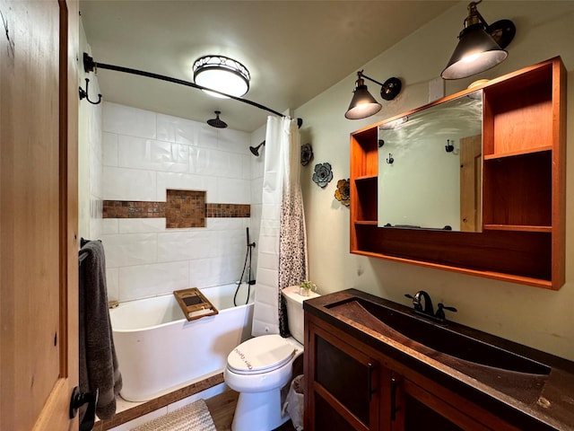 bathroom with shower / bath combo with shower curtain, toilet, and vanity