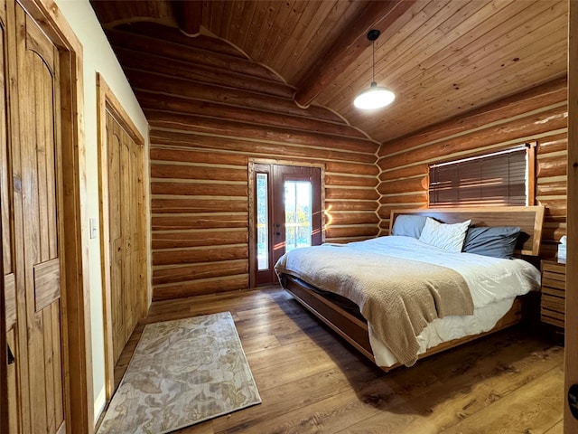 bedroom with vaulted ceiling, wood-type flooring, wooden ceiling, access to outside, and rustic walls