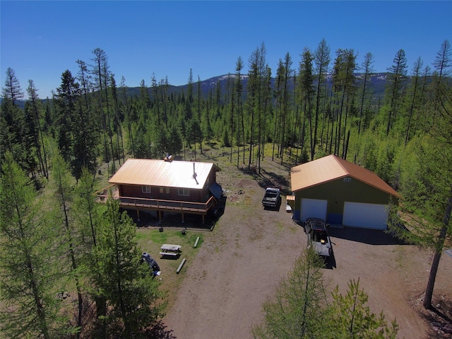 1081 Old Barn Rd, Seeley Lake, MT 59868 - view from above of property featuring a forest and a mountainous background