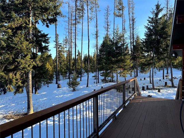 view of snow covered deck