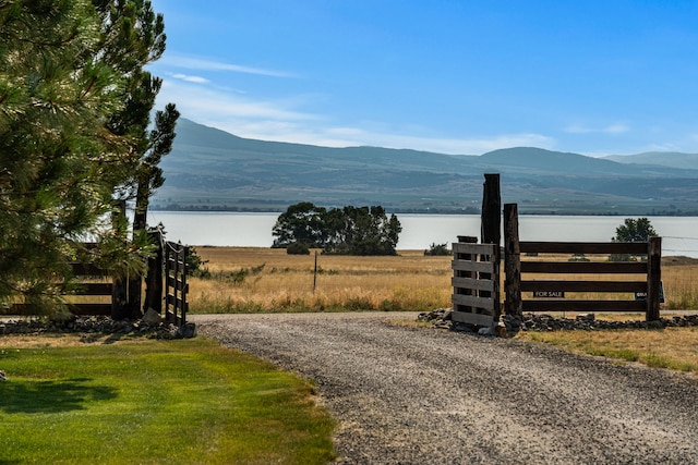 property view of mountains featuring a water view