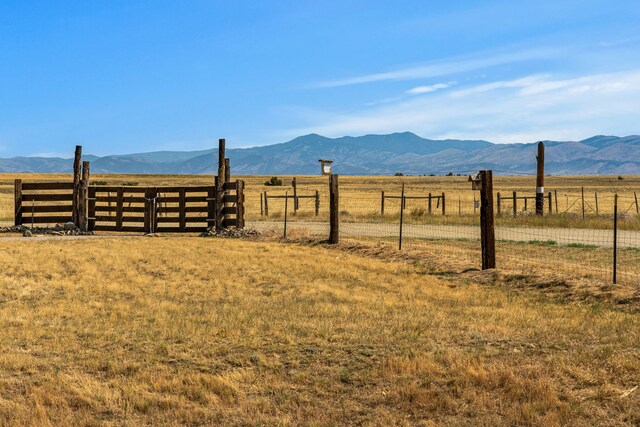mountain view featuring a rural view