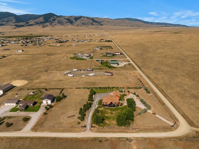 drone / aerial view with a rural view and a mountain view