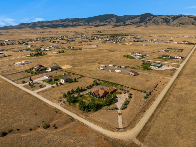 bird's eye view with a rural view and a mountain view