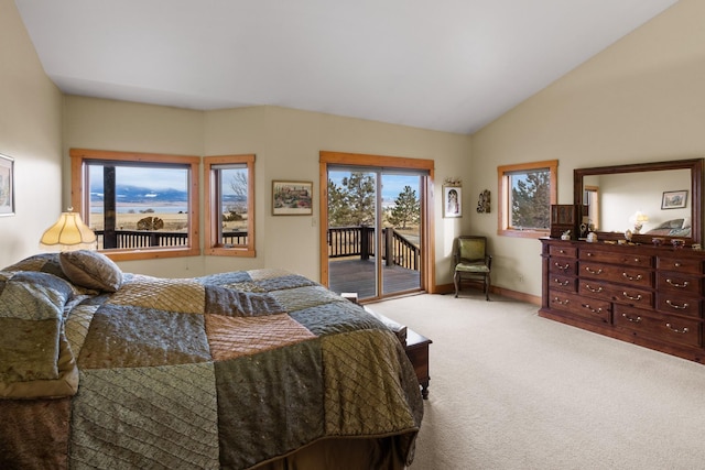 carpeted bedroom with access to exterior, baseboards, and lofted ceiling