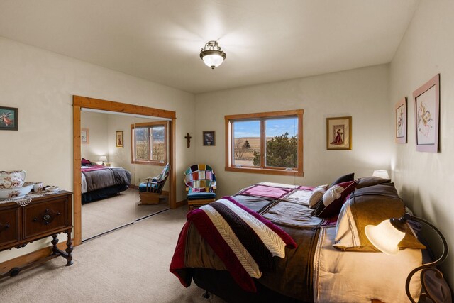 bedroom with light carpet