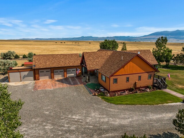 aerial view featuring a rural view and a mountain view