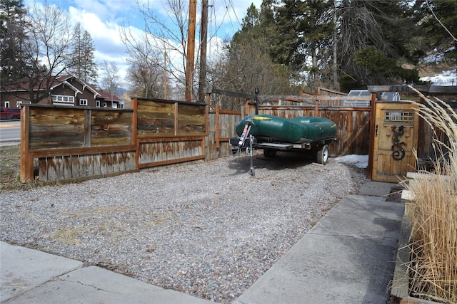 view of yard with a gate and fence