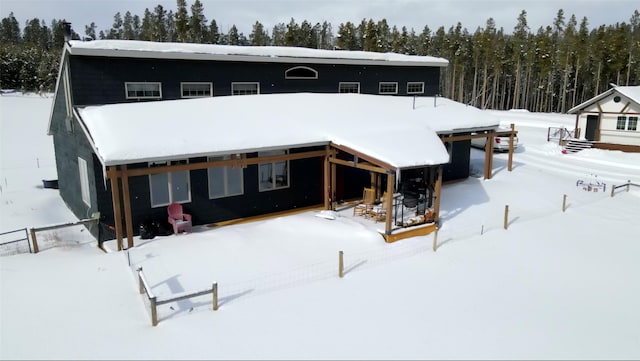 view of snow covered property