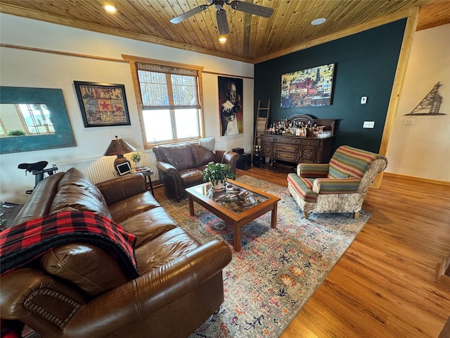 living area featuring crown molding, wood ceiling, recessed lighting, wood finished floors, and a ceiling fan