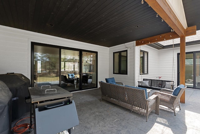 view of patio / terrace with area for grilling and an outdoor living space